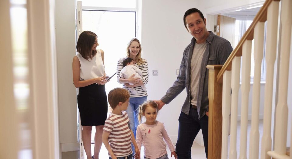 Realtor leads young family into home 978b8d064138018a1dfad71b9882dd21